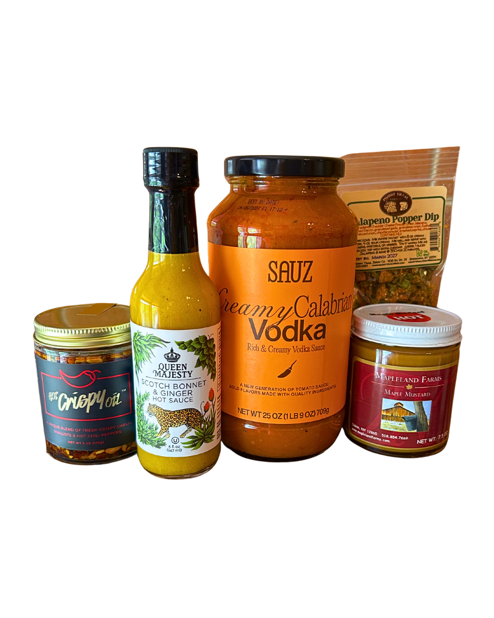 Spice Lovers gift bundle with crispy chili oil, Scotch bonnet hot sauce, Calabrian vodka sauce, maple mustard and jalapeño popper dip mix from CLUTCH Market Greenwich NY